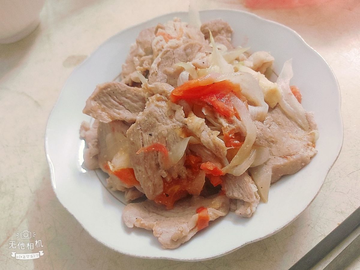 Thịt heo xào hành tây cà chua