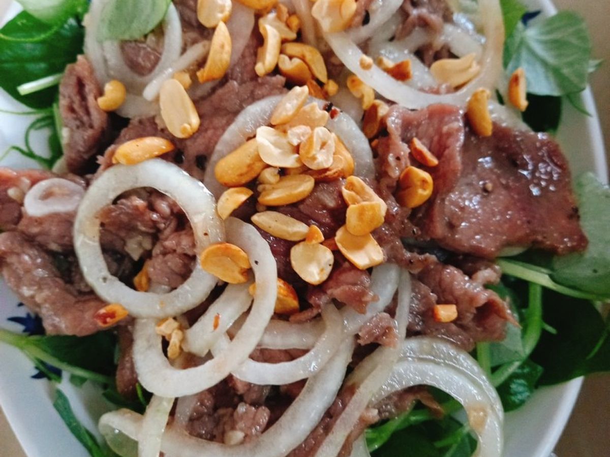 Bò xào lót rau càng cua