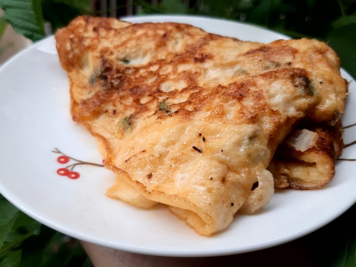 Trứng chiên nấm rơm hành tây